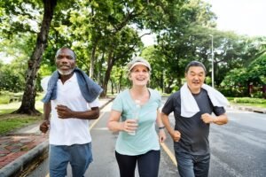 group senior friends jogging together